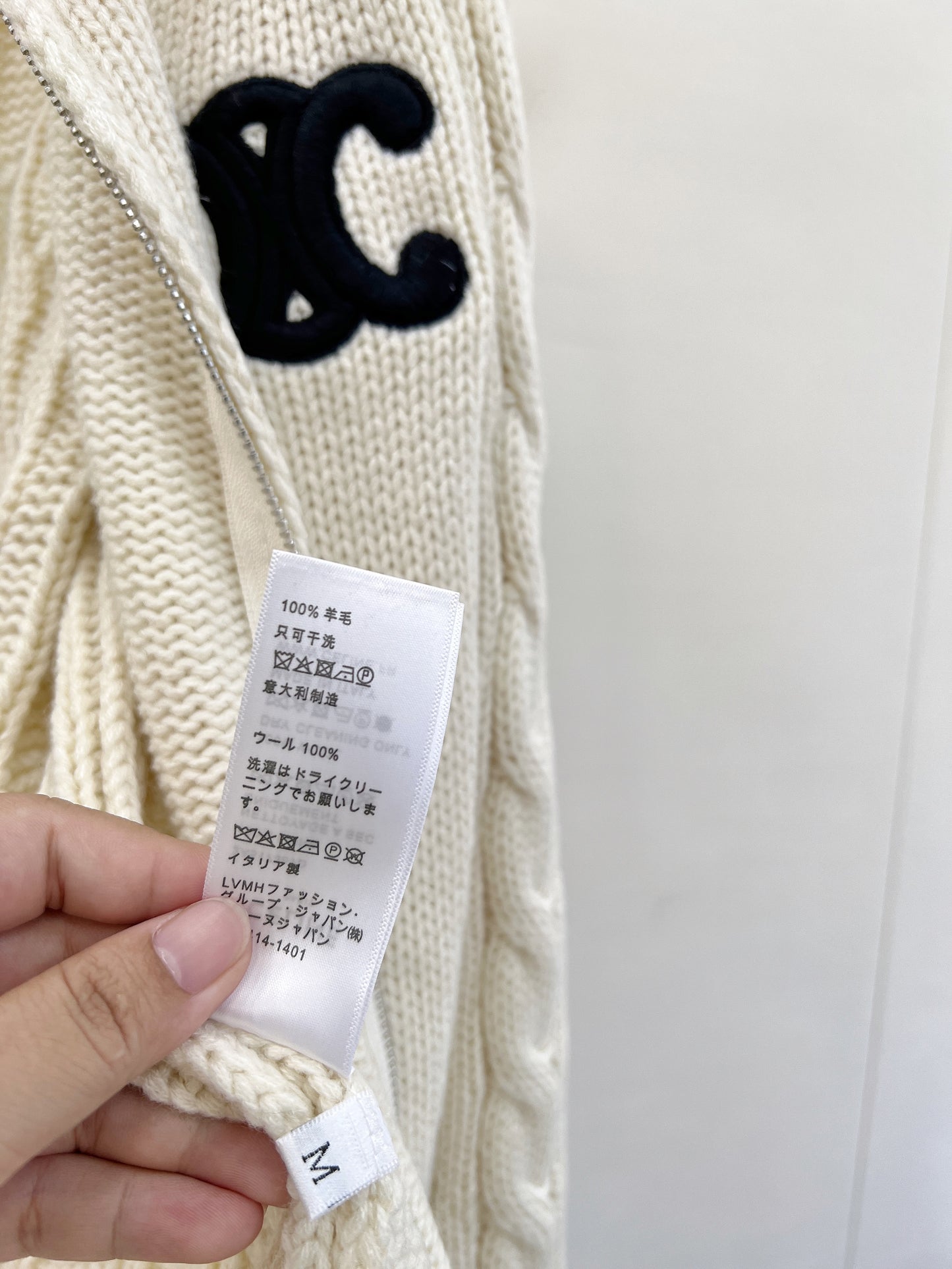 Cardigan en cachemire avec bouton cartable