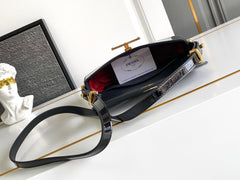 Black Patent Leather Baguette Bag with Gold Accents