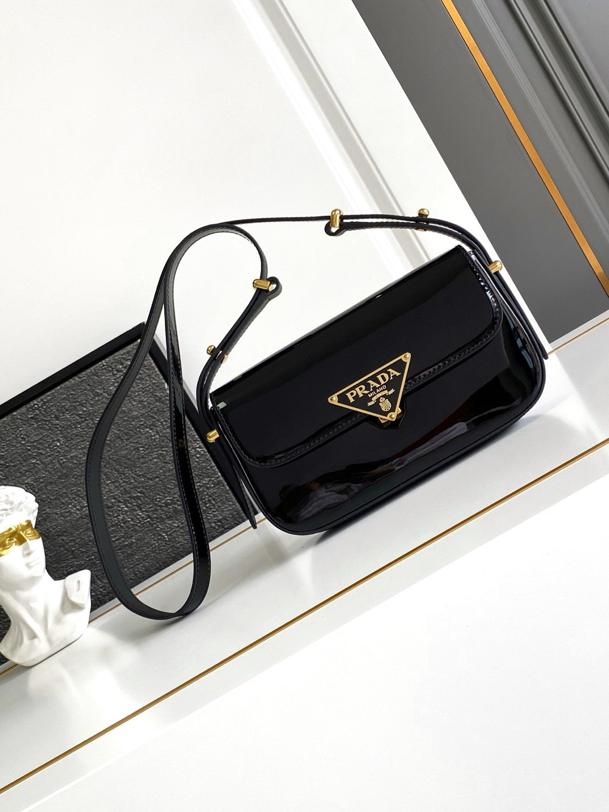 Black Patent Leather Baguette Bag with Gold Accents