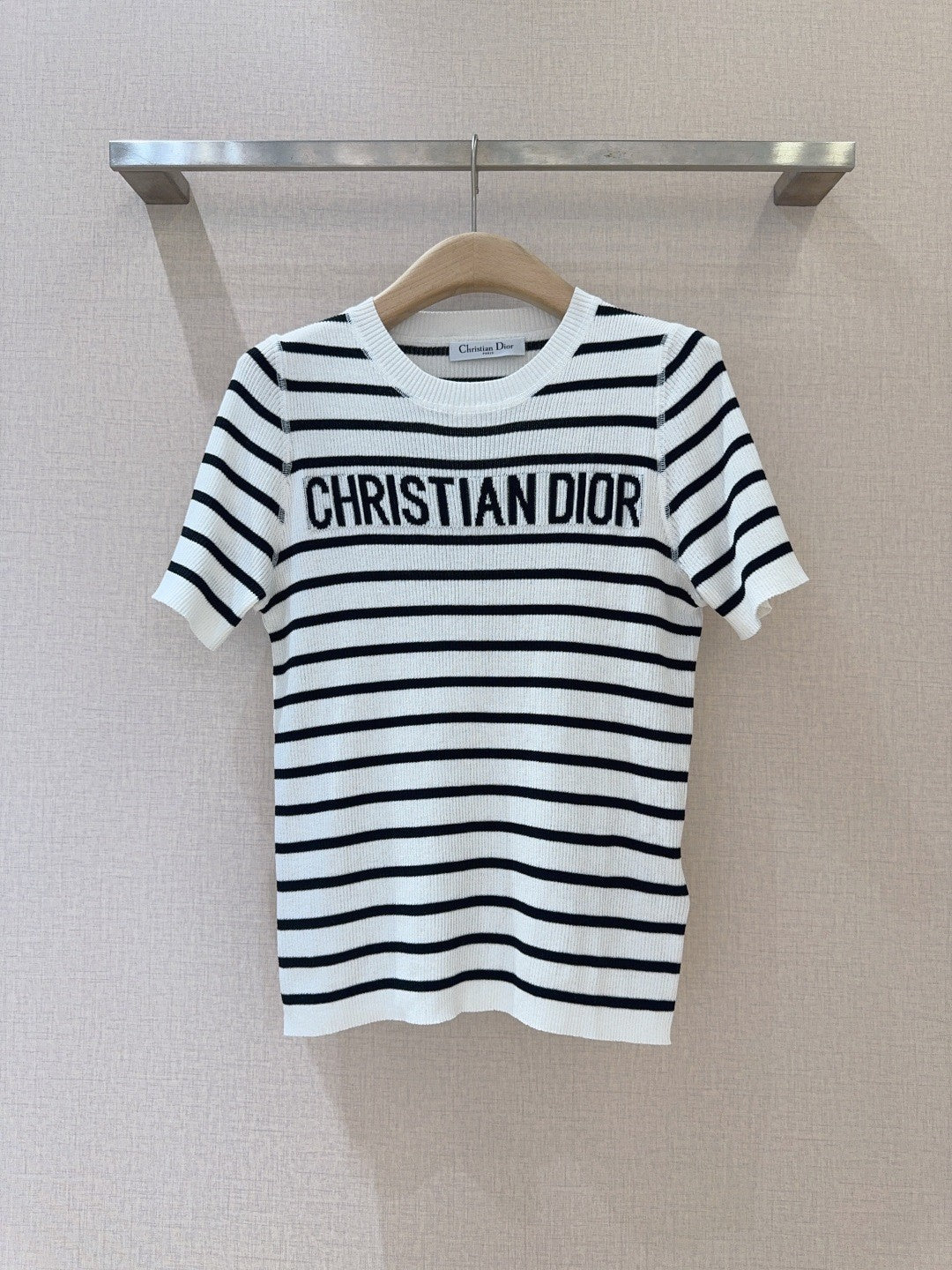 Monochrome Stripe Knit Top with Bold Text Embellishment
