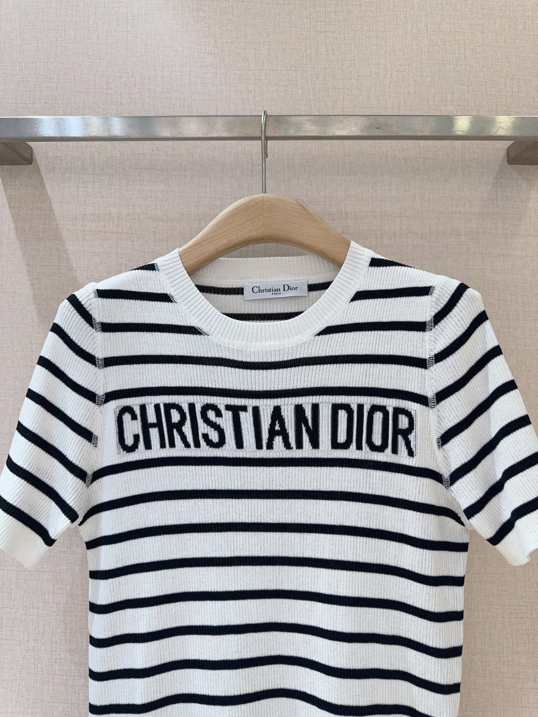 Monochrome Stripe Knit Top with Bold Text Embellishment