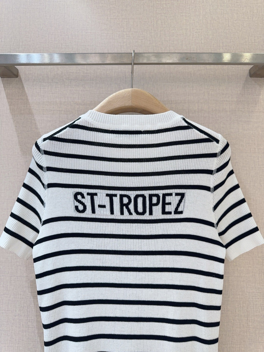 Monochrome Stripe Knit Top with Bold Text Embellishment