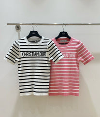 Monochrome Stripe Knit Top with Bold Text Embellishment