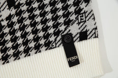 Pull en tricot pied-de-poule