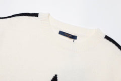 pull jacquard tricoté