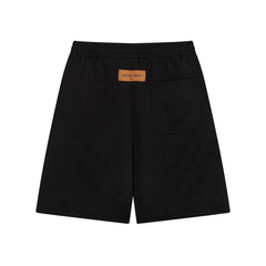 Dunkle, geblümte Strickshorts