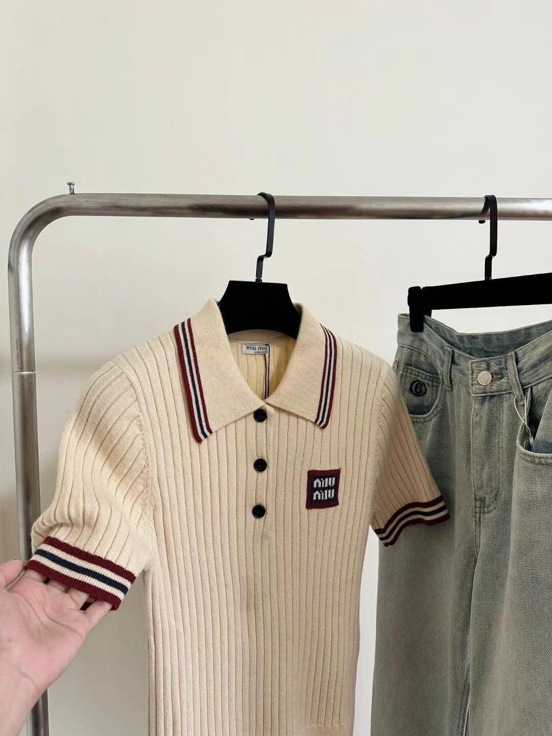 Col polo tricoté color block à manches courtes