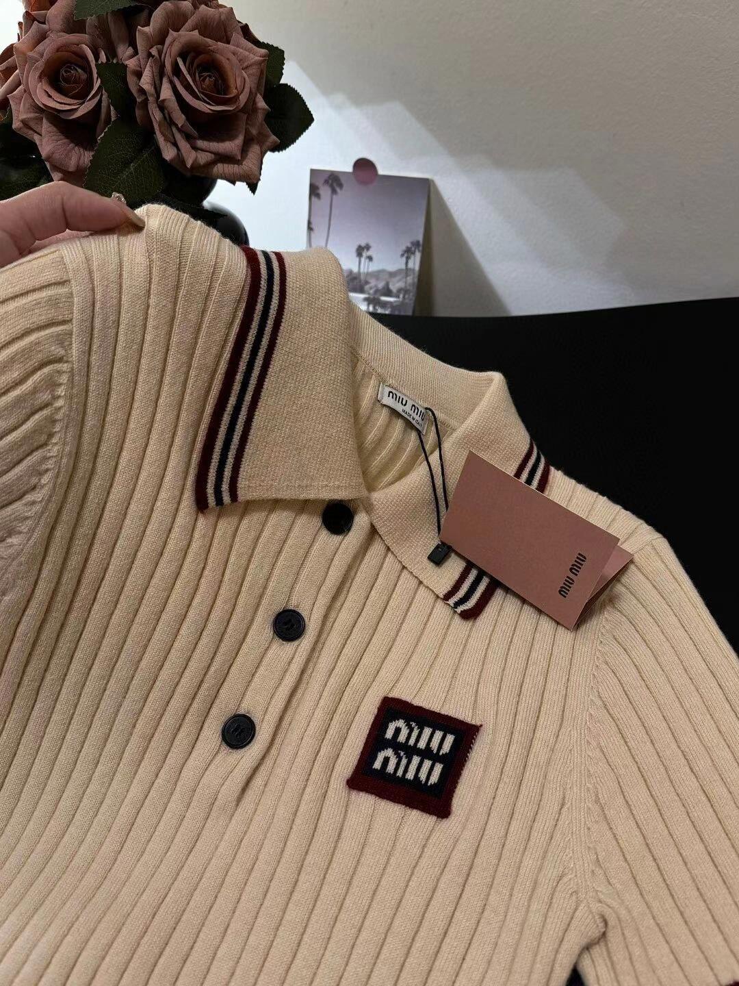 Col polo tricoté color block à manches courtes