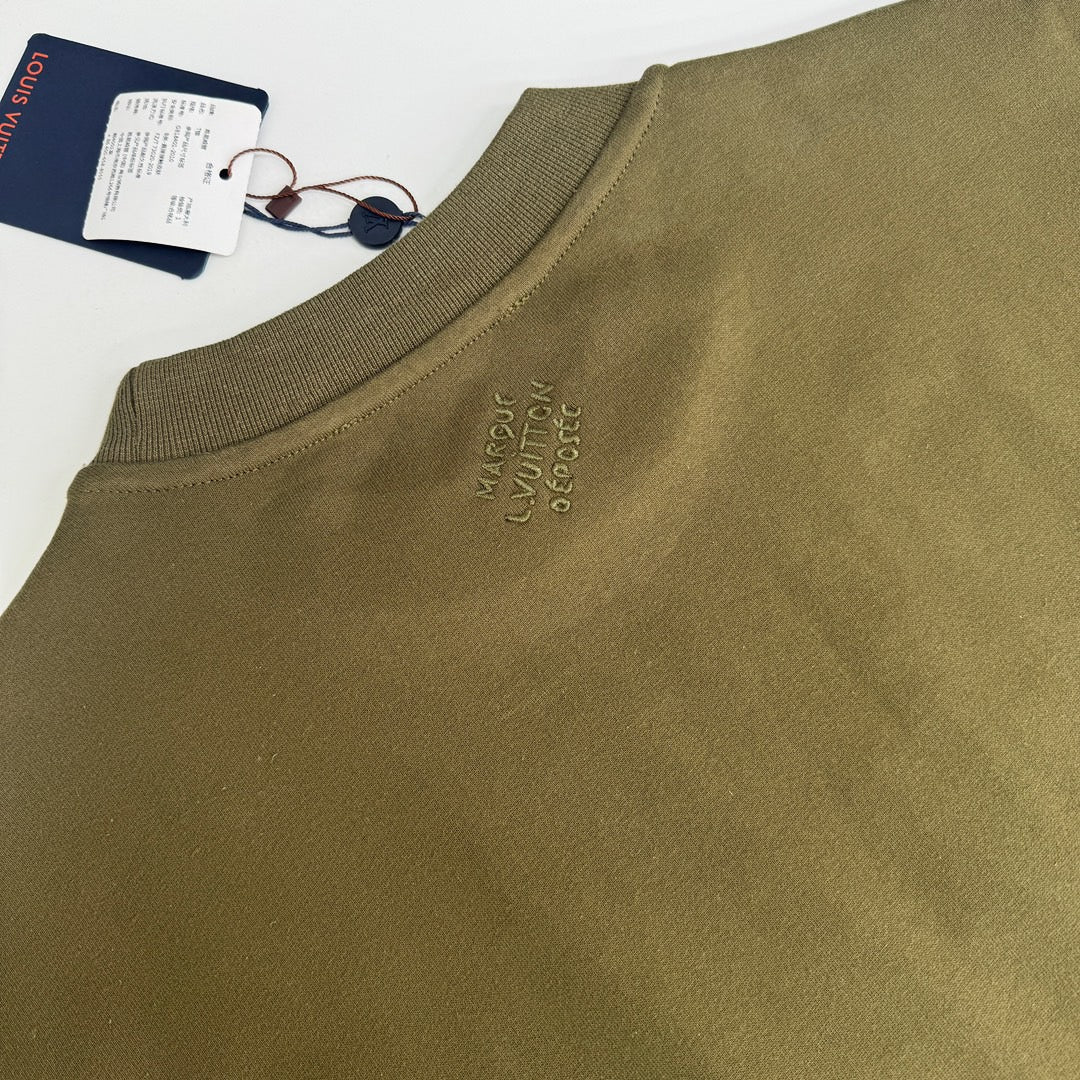 Floral embroidered studded cotton crew neck shirt