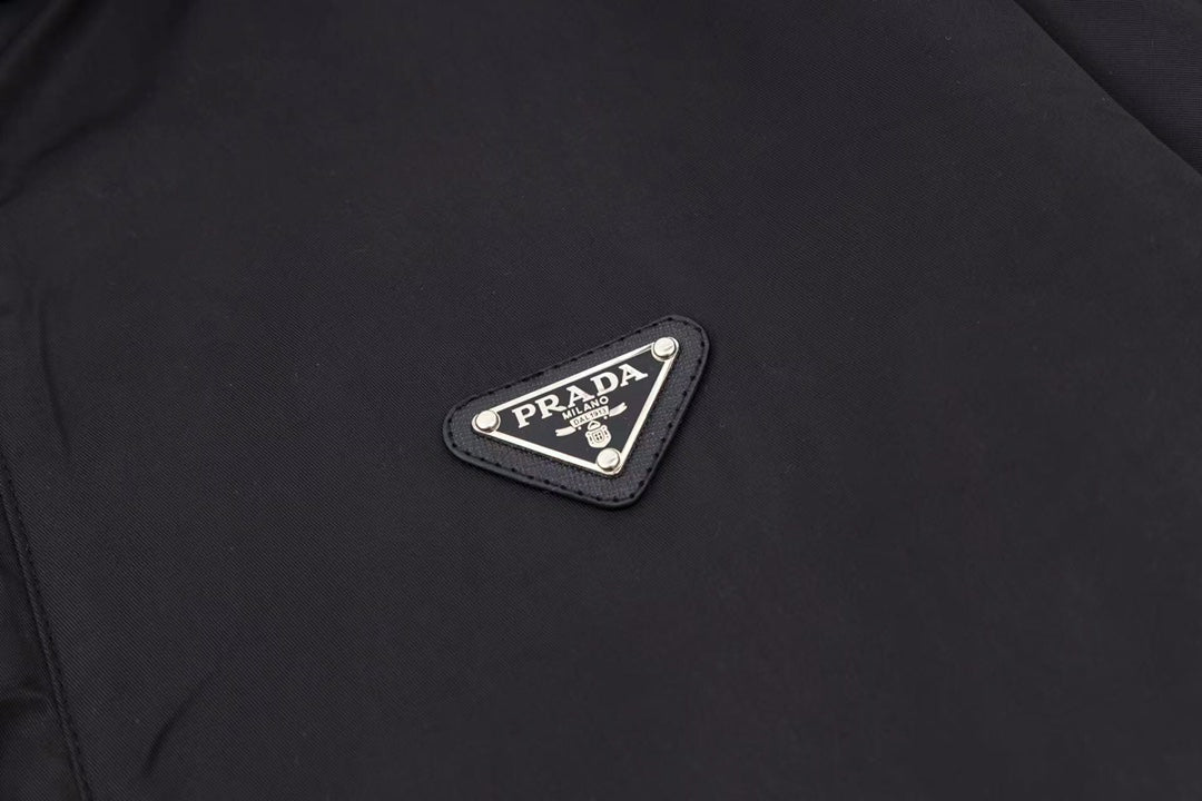 veste légère à logo triangulaire