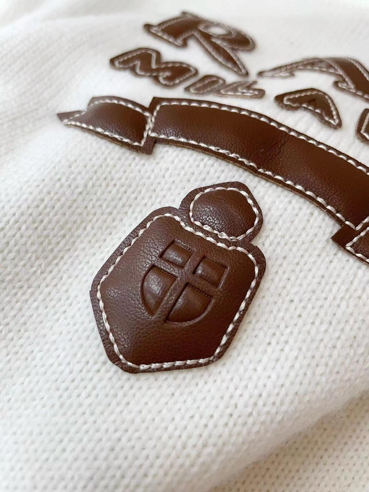 PRD neues Buchstabenlogo gehäkelt