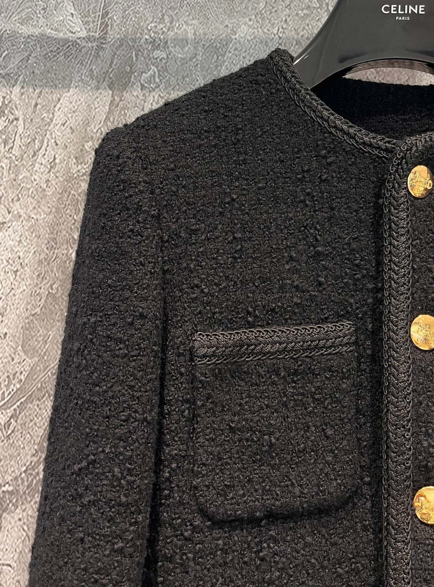 Veste en tweed noir et or