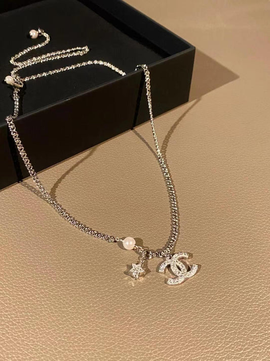 New star and logo diamond necklace