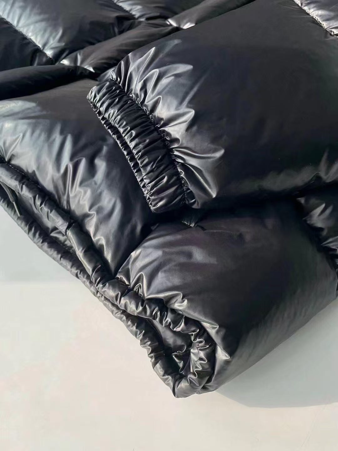 Daunenjacke mit Kapuze und Druckknöpfen