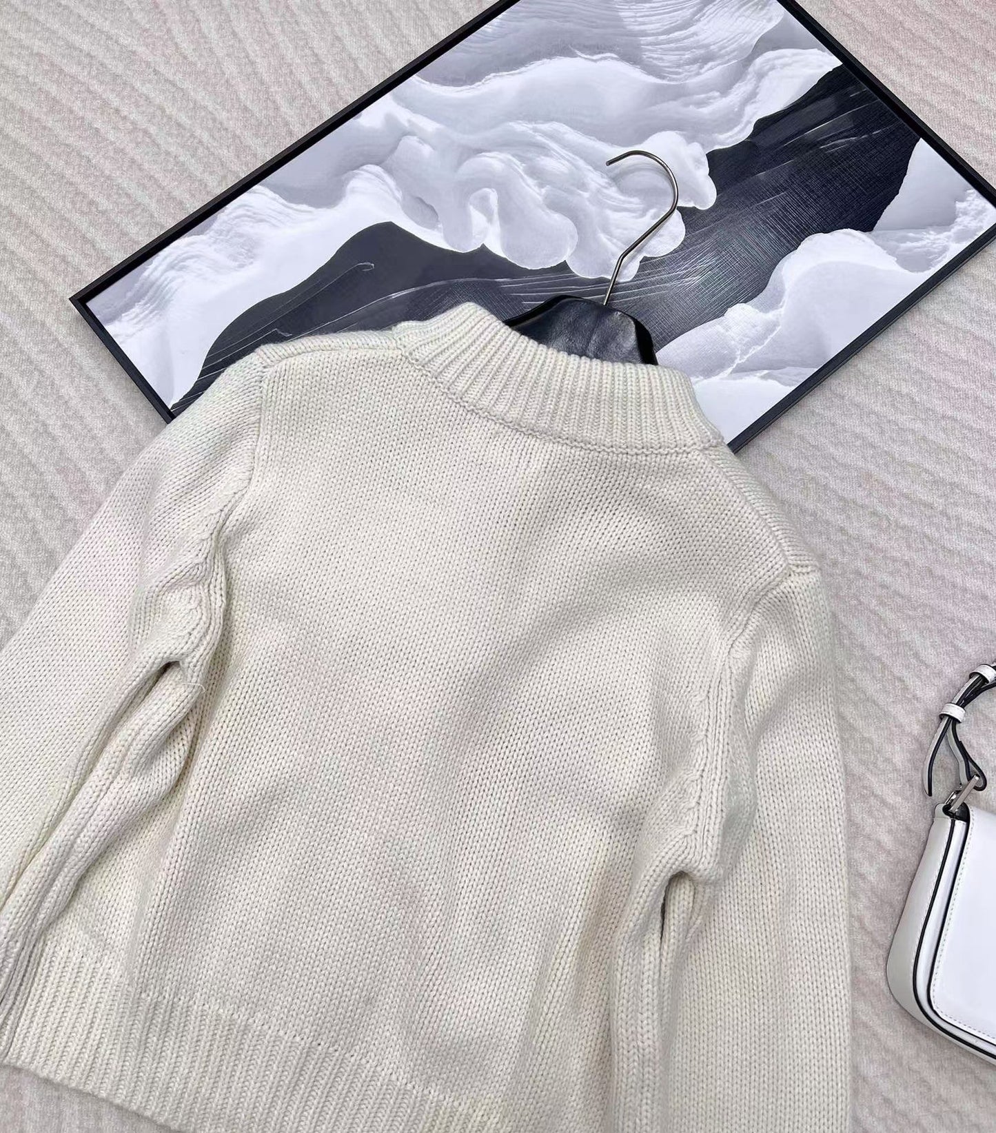 Neue Strickpulloverjacke