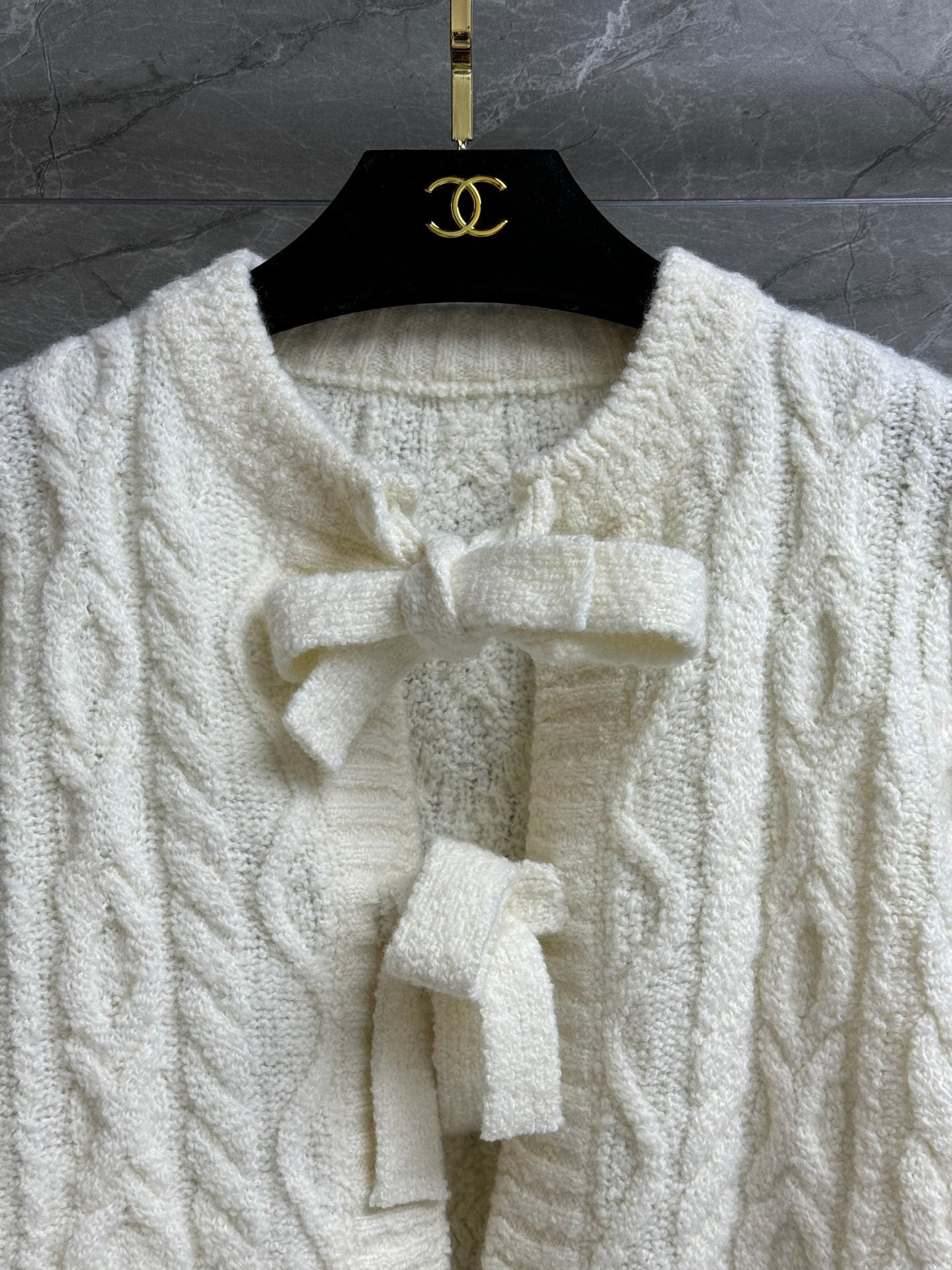 Cardigan à nœud papillon