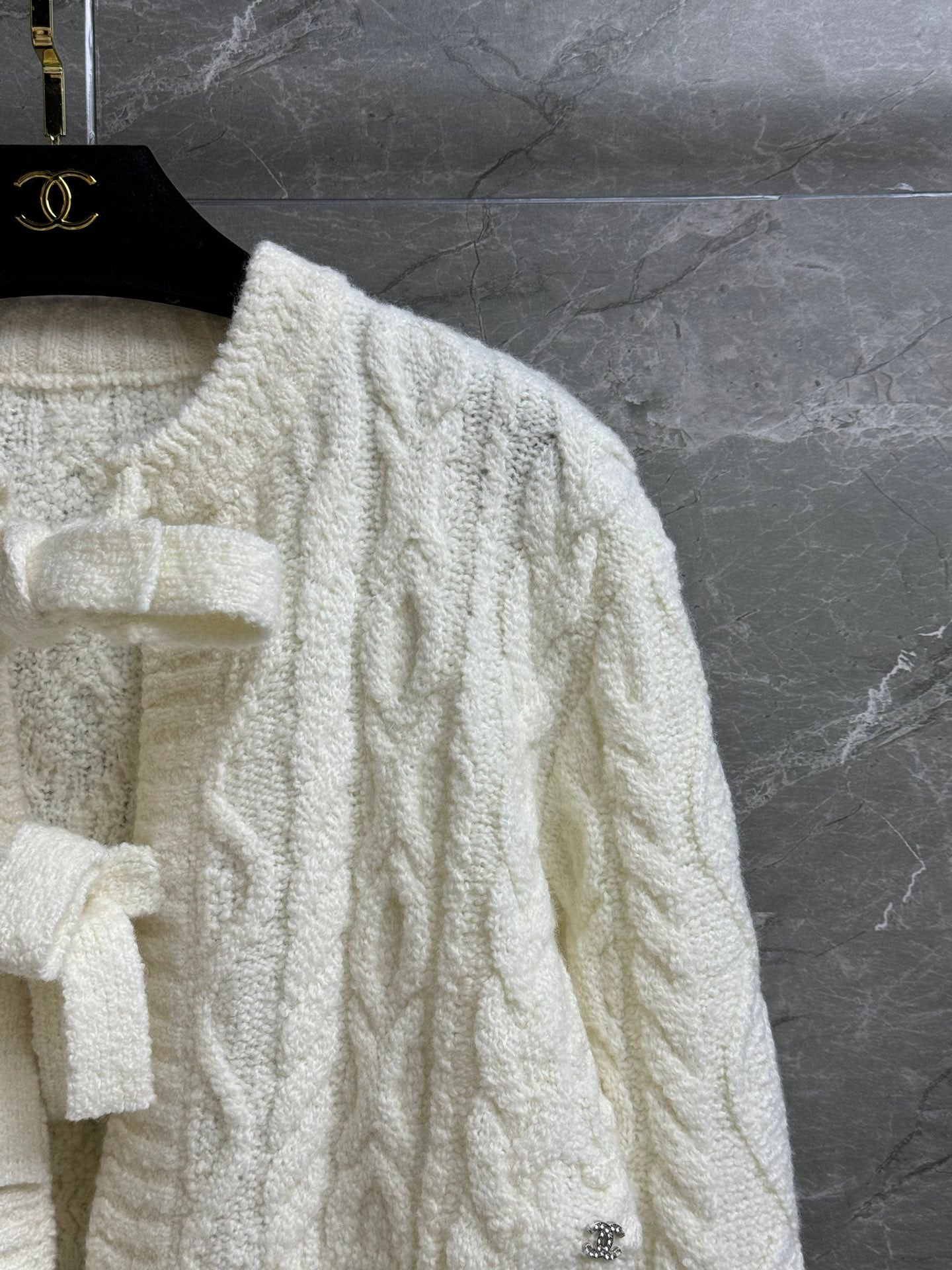 Cardigan à nœud papillon