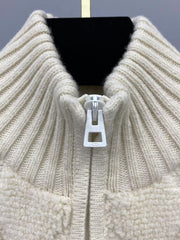 Veste zippée en laine brodée à pompons