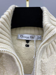 Veste zippée en laine brodée à pompons