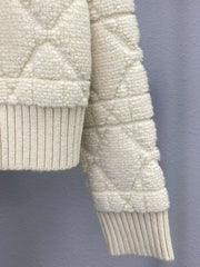 Veste zippée en laine brodée à pompons