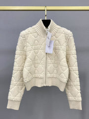Veste zippée en laine brodée à pompons