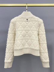 Veste zippée en laine brodée à pompons