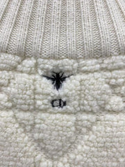 Veste zippée en laine brodée à pompons