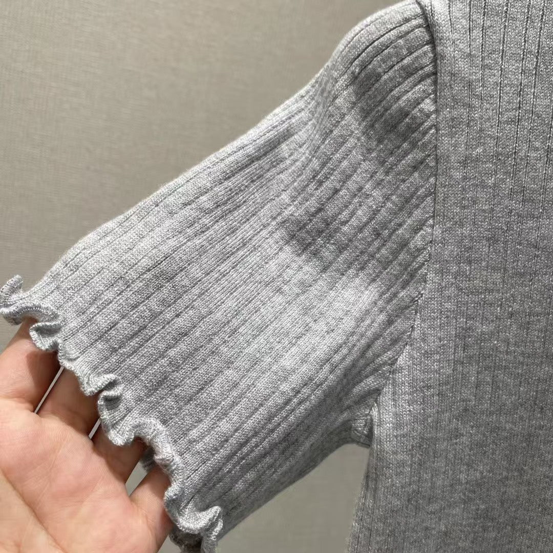 manches courtes tricotées avec logo brodé