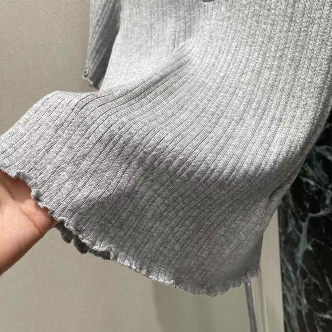 manches courtes tricotées avec logo brodé