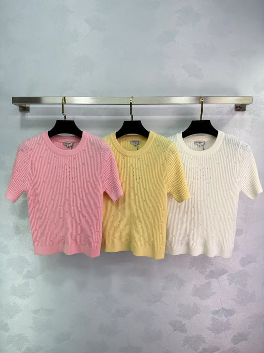 Nouveau col rond tricoté à manches courtes au début du printemps