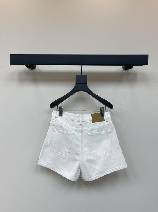 White denim shorts with embroidered letters