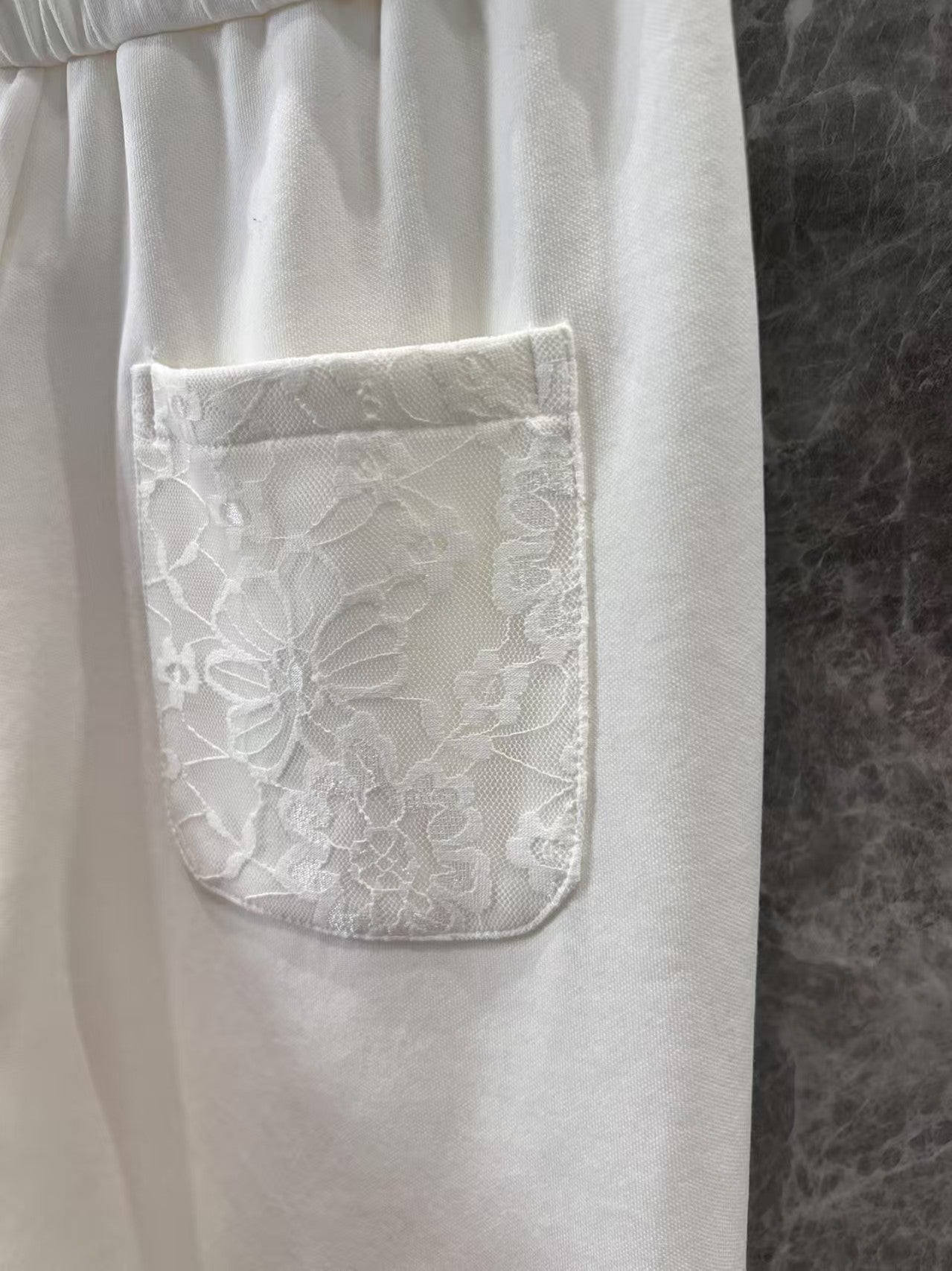 Pantalon décontracté à double taille avec cordon de serrage