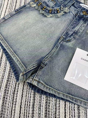 Heavy rivet tassel embroidered denim shorts