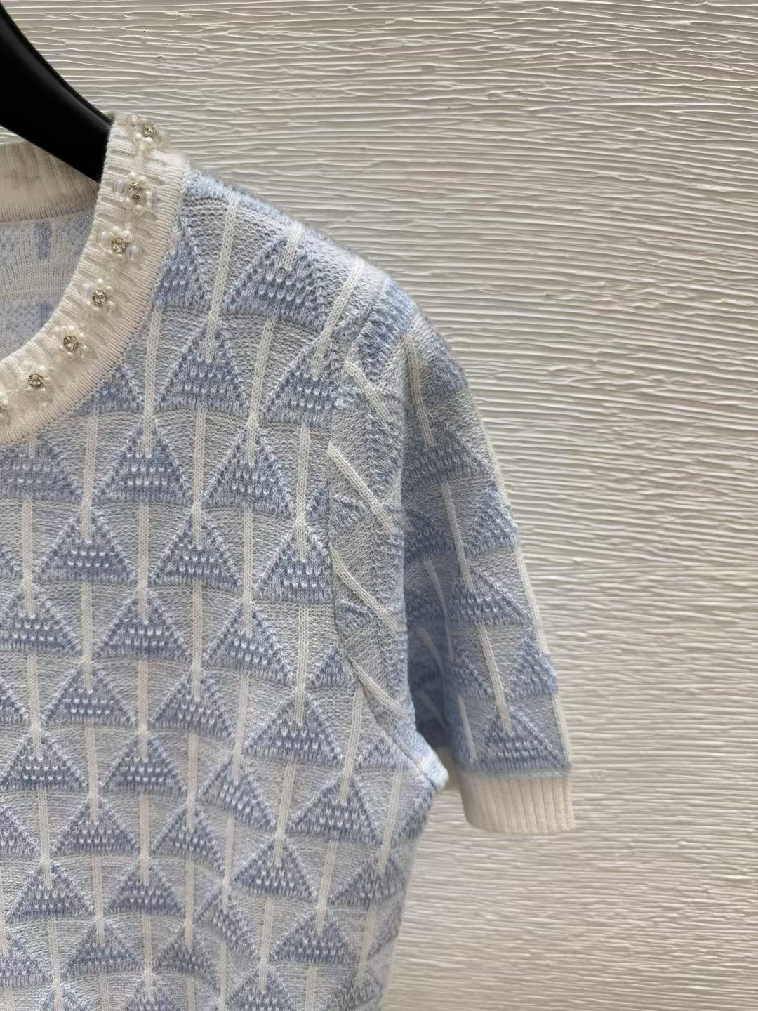 Col ras du cou, manches courtes en tricot perlé