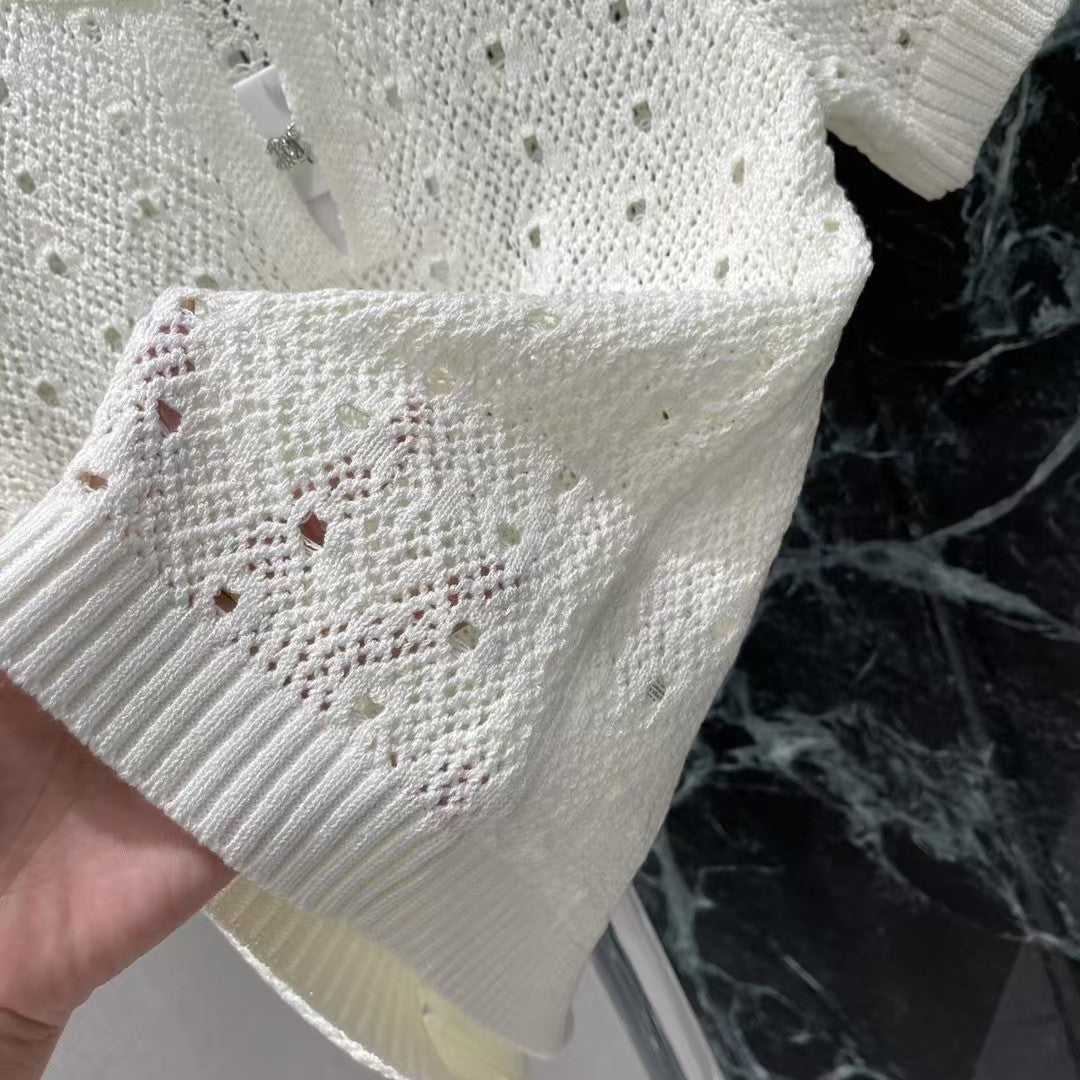 Gestrickte, hohle kurze Ärmel