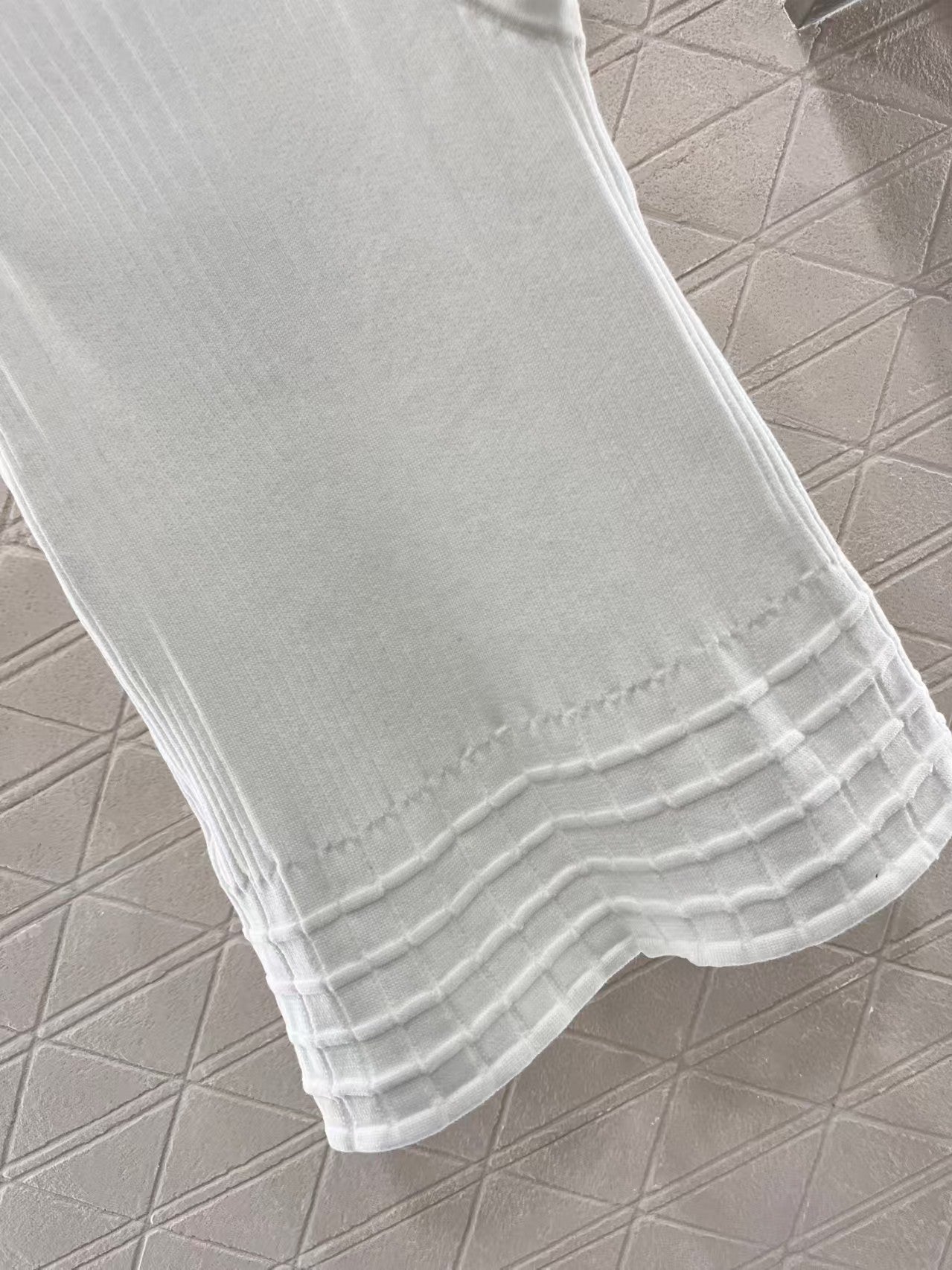 Gilet tricoté à motif 3D