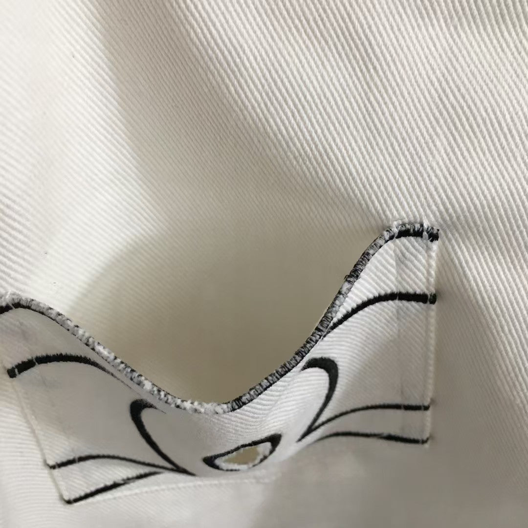 Short en jean à poches brodées