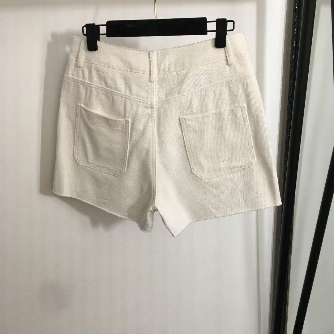 Short en jean à poches brodées