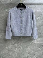 Cashmere cardigan with school bag button