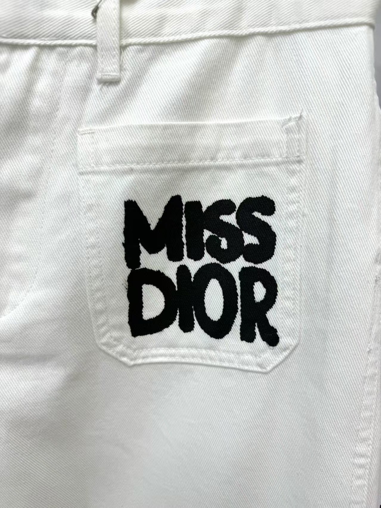 New arrival double front pocket printed letter denim