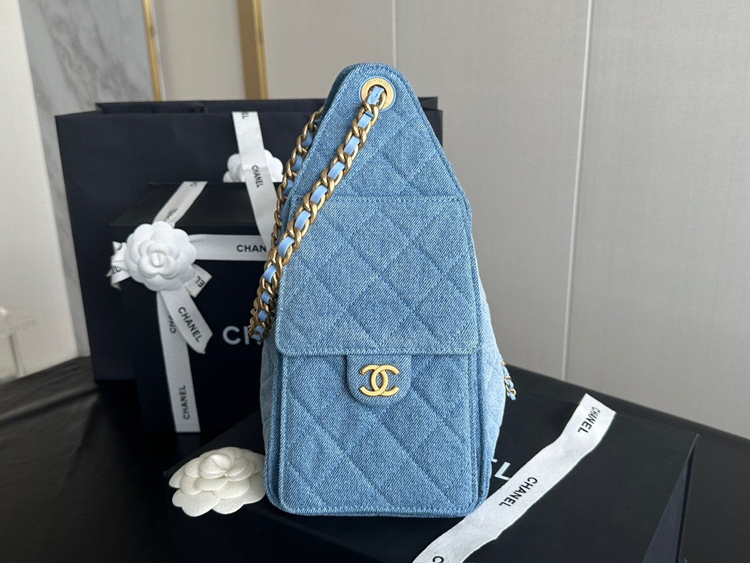 Sac seau matelassé en denim avec chaîne contrastée 