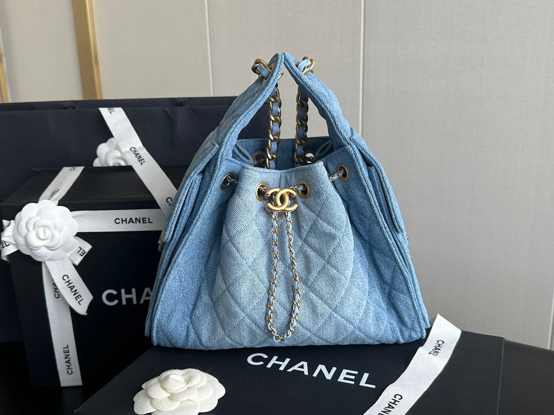 Sac seau matelassé en denim avec chaîne contrastée 