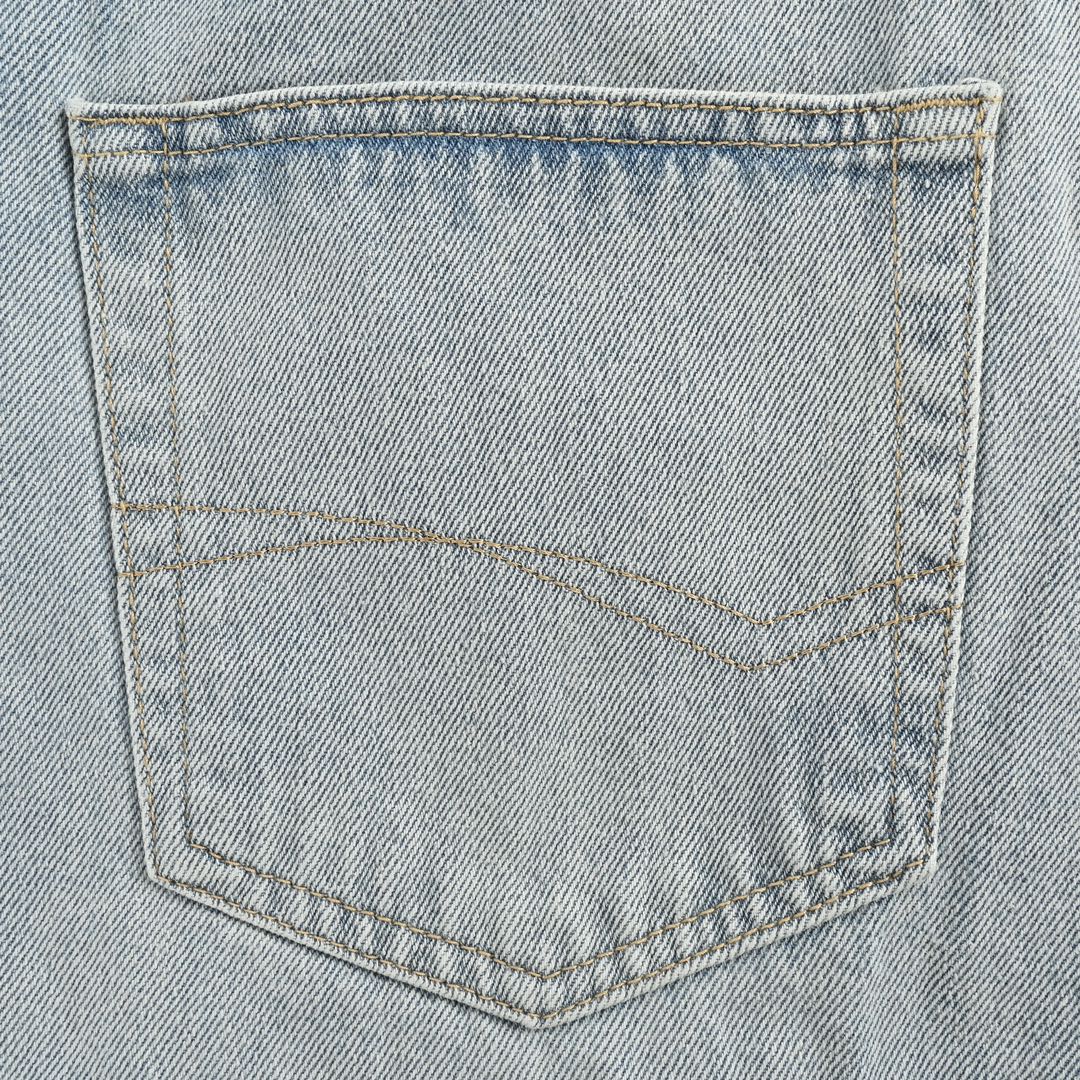 short en jean à ourlet à pompons vieilli