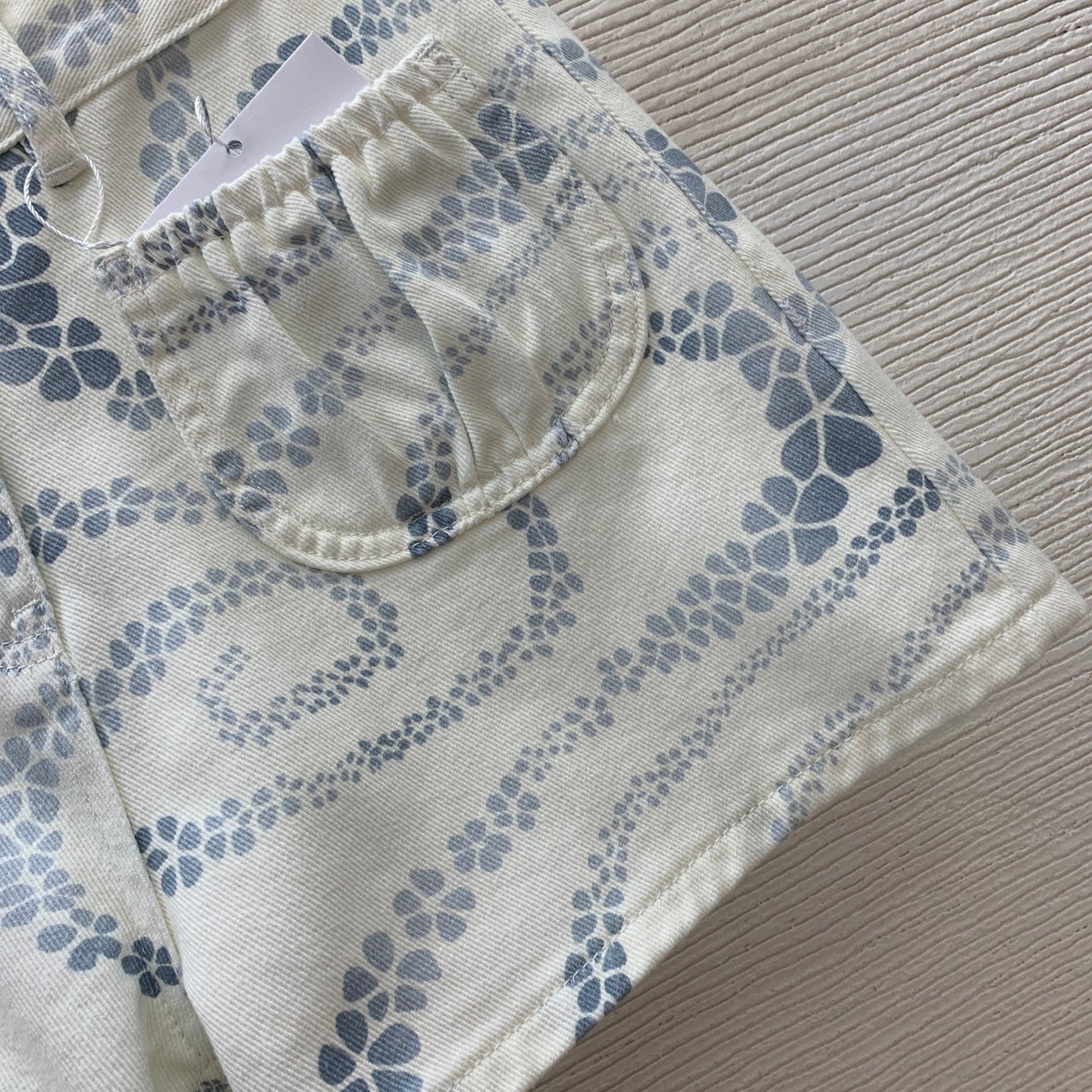 Dual-Textile Bottoms: Printed Denim Shorts + Knit Mini Skirt