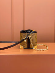 Noé Purse V Charms Monogram Reverse