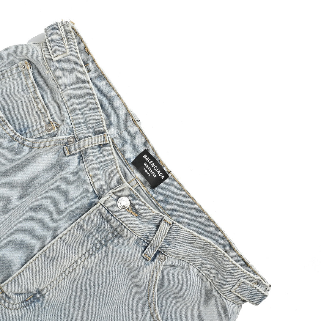 short en jean à ourlet à pompons vieilli