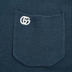 Polo tricoté à manches courtes avec poche brodée 