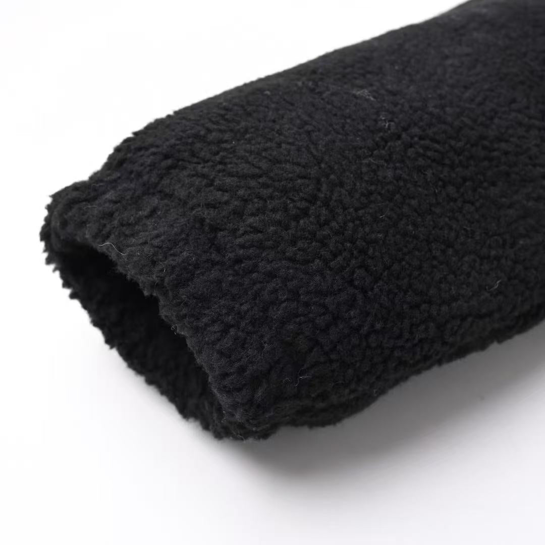 Veste matelassée en laine d'agneau noire avec poche