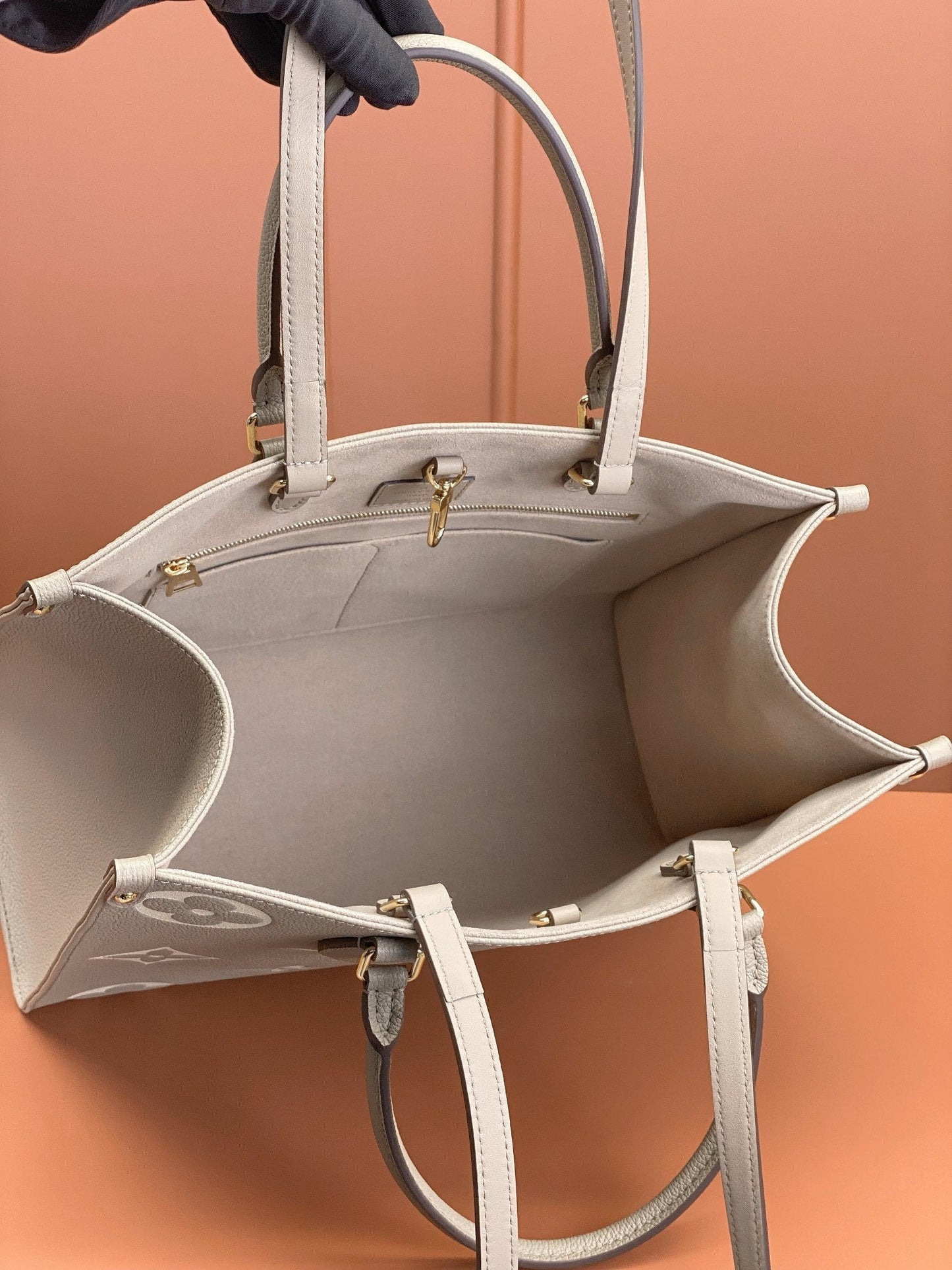 Onthego MM Bicolor Monogram Empreinte Leder