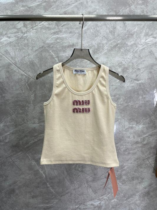 Gilet en diamant et rubis